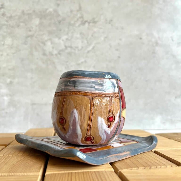 Clay Coffee Cup With a Saucer