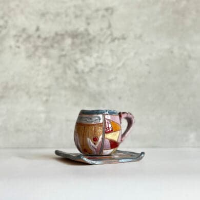 Clay Coffee Cup With a Saucer